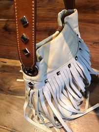 Borsetta in pelle color crema con frange