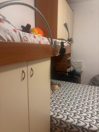 armadio a ponte con letto matrimoniale