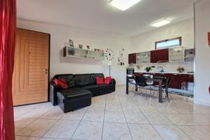 Trivano con veranda e posto auto coperto