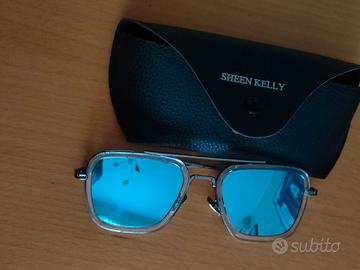 Occhiali da sole  unisex lente azzurra