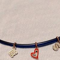 BRACCIALE CON CIONDOLINI SCRITTA "BEST"