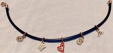 BRACCIALE CON CIONDOLINI SCRITTA "BEST"