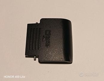 Coperchio vanno scheda SD Nikon D3100