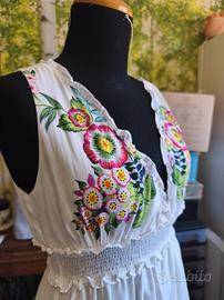 Abito a fiori desigual taglia 42