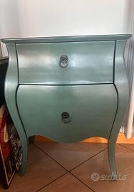Coppia di comodini bombati stile barocco