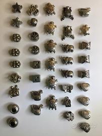 Charms in peltro