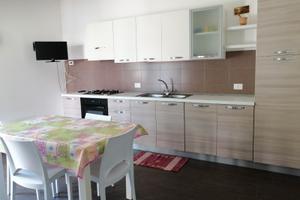 Trilocale con giardino