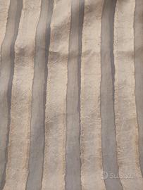 Taglio stoffa per tende