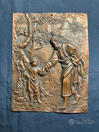 Antica placca in rame sbalzato