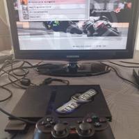 PS2 slim + 2 giochi