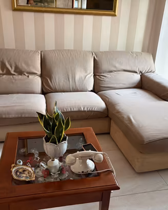 Divano letto con penisola e poltrona relax