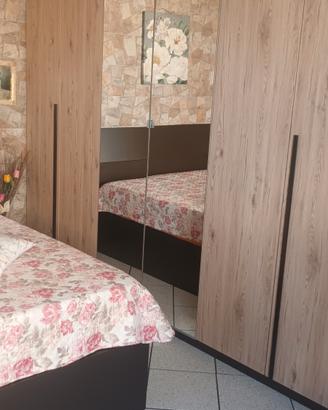 camera da letto con materasso 