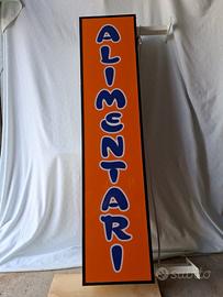 Insegna luminosa per attività commerciale