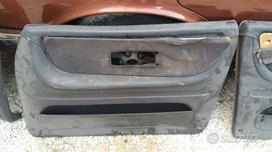 Coppia di pannelli portiere dx- sx saab 900 cabrio