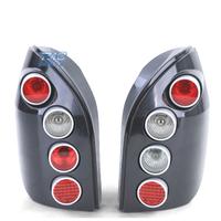 FANALI PER OPEL ZAFIRA A 99-05 HELLA NERO