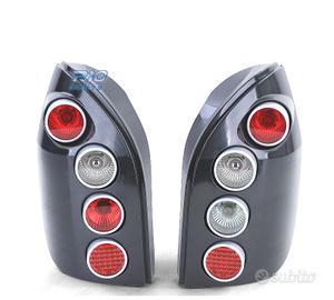 FANALI PER OPEL ZAFIRA A 99-05 HELLA NERO