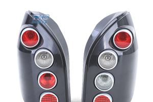 FANALI PER OPEL ZAFIRA A 99-05 HELLA NERO