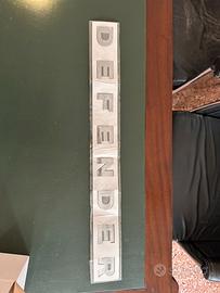 Scritta Defender cofano