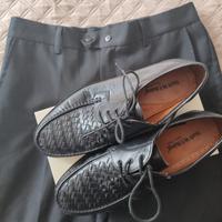 Scarpe e pantaloni divisa cameriere – alberghiera