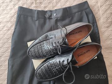 Scarpe e pantaloni divisa cameriere – alberghiera