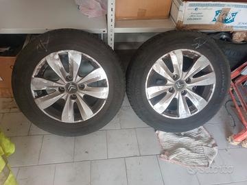 4 cerchi  in lega raggio 15 con gomme 