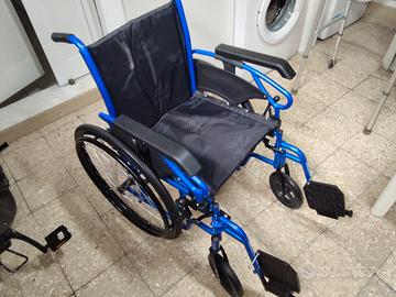 Sedia a rotelle e deambulatore