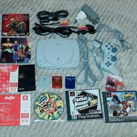 Playstation one + accessori e giochi
