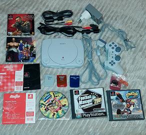 Playstation one + accessori e giochi