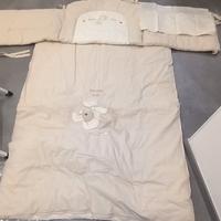 Trapunta con cuscino e paracolpi per culla