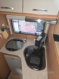 camper mansardato con letto nautico