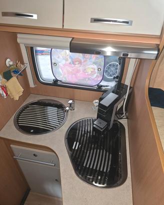 camper mansardato con letto nautico
