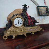 orologio da camino anticoin bronzo.