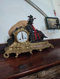 orologio da camino anticoin bronzo.