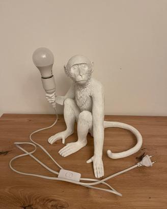 Lampada scimmia seduta