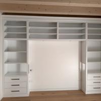 Libreria a ponte con cassetti