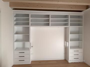 Libreria a ponte con cassetti