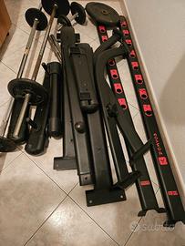 Rack palestra Domyos con bilanciere e manubri