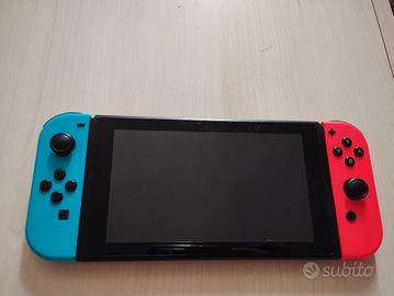 Nintendo  Switch + custodia + due giochi
