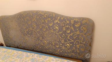 letto matrimoniale con testata sfoderabile.