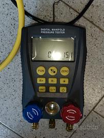 pompa vuoto , misuratore pressione multi e bombola