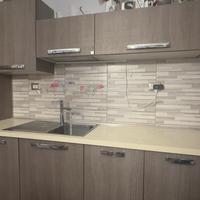 Cucina STOSA con elettrodomestici e tavolo