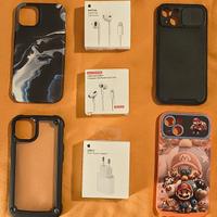 Custodie iPhone 13 e un auricolare con filo