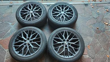 Cerchi in lega AEZ Porto Dark + gomme invernali
