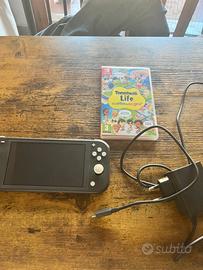 Nintento Swifch Lite + Tomodachi Life