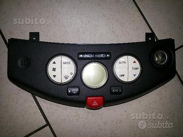 Comando clima nissan micra 2006