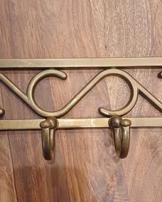 Attaccapanni in ottone.