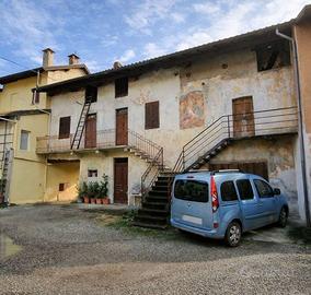 Porzione di Casa a Taino