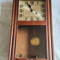 orologio a pendolo da parete