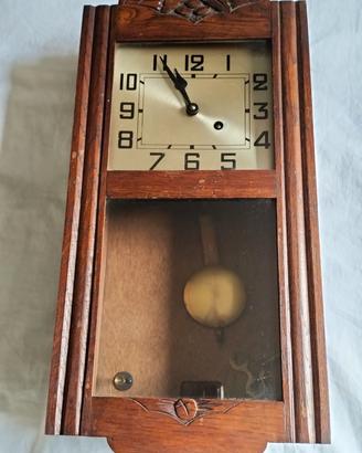 orologio a pendolo da parete