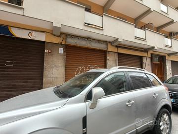 SERRADIFALCO/C.PARISIO, piccolo negozio, 1 luce